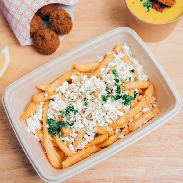 Jarasa Kabob's crispy falafel, golden french fries with feta and parsley, and a cup of soup.